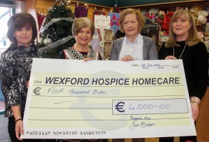 Presentatio of a cheque of four thousand euro to Wexford Hospice Homecare proceeds of a coffee morning in Boggans Shop. Diane Cullen (Wexford Hospice Homecare), Joan Boggan (Boggans), Margaret McDonald (Wexford Hospice Homecare) and Linda Carley (Boggans)